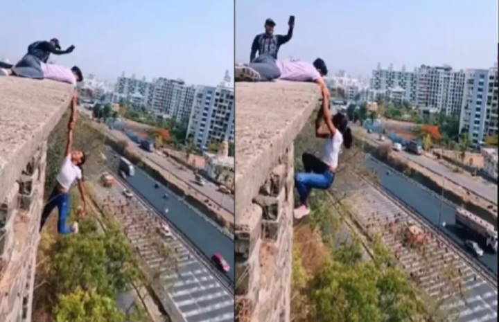 रील बनाने के चक्कर में जान की भी परवाह नहीं……ऊंची इमारत से लटकी&nbsp;लड़की……!!